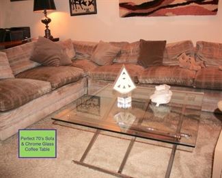 Sectional & Chrome & Glass Coffee Table with Decorative Items