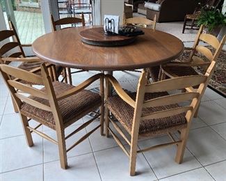 ROUND DINING TABLE ON METAL BASE
6 LADDER BACK ARM CHAIRS WITH CUSHION
