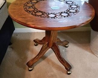 Wood Pedistal  Round Table w/burnt carved design on top on wheels 30Roundx26	 $125.00 
