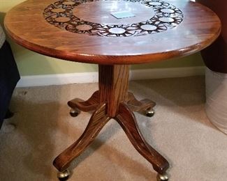 Wood Pedistal  Round Table w/burnt carved design on top on wheels 30Roundx26	 $125.00 
