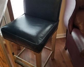 #35	Tall Table Wood - 36sq x 42 height	 $75.00 
#36	(2) 29"Tall Blue Leather Wood Barstools w/nailhead trim	 $100.00 
