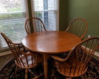 #66	Ethan Allen  Round Dining Table w/6 chairs (all captains chairs)  44 diameter	 $250.00 
