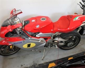 Rare signed Giacomo Agostini limited edition MX Agusta F4 AGO motorcycle w/ cover and jump suit