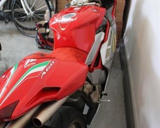 Rare signed Giacomo Agostini limited edition MX Agusta F4 AGO motorcycle w/ cover and jump suit