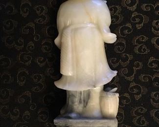 Back view of figurine