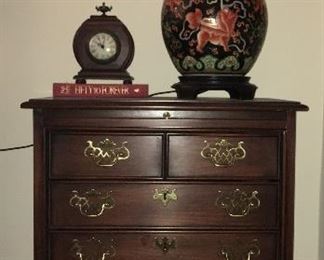 Chippendale Bachelor's chest; Asian ginger jar lamp; table clock