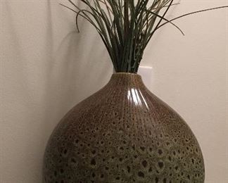 Ceramic vase with artificial plant