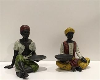 Candle holder figurines