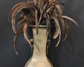 Vase with feathers