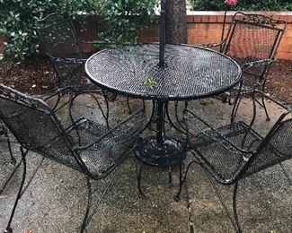 Vintage wrought iron patio table and chairs