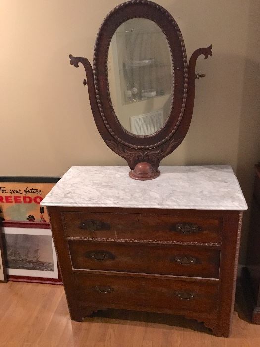 Victorian Mitchell & Rammelsburg antique marble top vanity dresser. Beautiful piece.