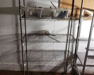 4 shelf storage rack with contents