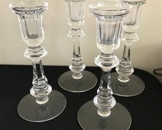 Set of four Waterford candlesticks