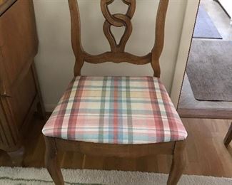 One of four dining room side chairs