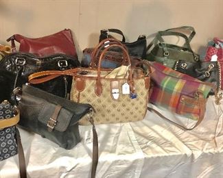 A large collection of purses 