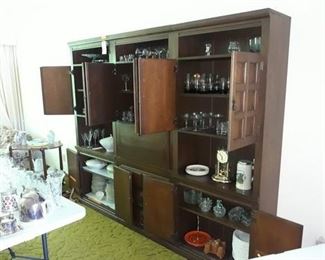 Three Piece Cabinet and a Generous Collection of Glassware and Dishes