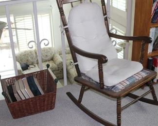 Rocking chair and bookcases.
