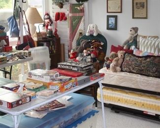 Trundle bed, twin bed linens, blankets, decorative pillows and cushions. Rocker glider, bookcases, lighthouses. games, puzzles and purses.