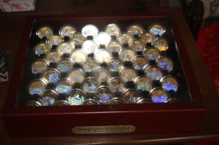 US quarter collection. Sealed coin boxes in a presentation box.