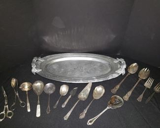 Silver goldfish tray and silverplated serving accessories. https://ctbids.com/#!/description/share/171959