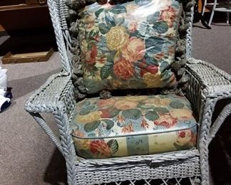 #130 Wicker Rocking chair with flower cushions $75.00 