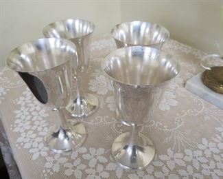 Sterling silver water goblets.