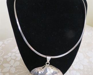 Sterling silver shell pendant necklace.