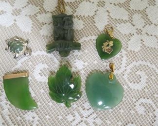 Jade pins and pendants.