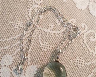 Sterling silver rock crystal locket.