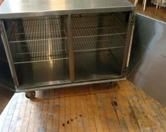 Stainless steel carts on wheels. Many available.