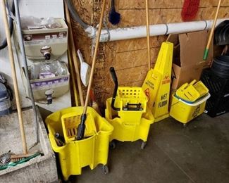 Mop buckets and wet floor signs
