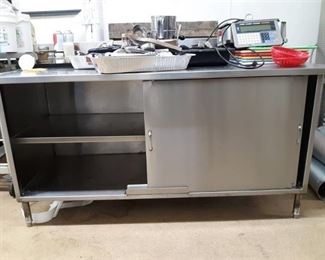 Stainless Steel Work Table with Backsplash and Sliding Door Cabinet