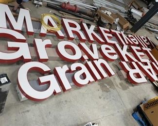 Oak Grove Grain Valley Market signs