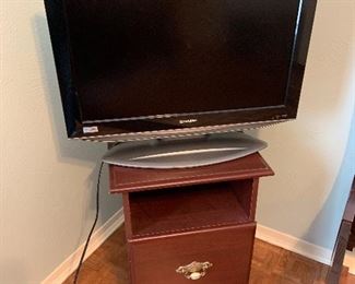 Cherry wood file cabinet
Sharp 24” flat screen TV