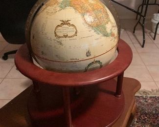 Globe in wooden holder
