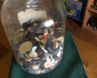 Vintage glass jar with buttons