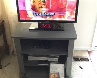 Samsung 42” TV like new sitting on Grey TV Stand with storage. Samsung DVD is available works like a charm.