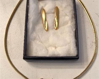 Sampling of the Costume Jewerly available at this sale. This Gold Tone Choker with Clear Rhinestones and Gold Tone Pierced Drop Earrings are the perfect set for any event.