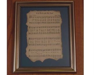 Antiqued Hymn Sheet Music Framed 14x10”. This beautiful framed hymn has been hand antiqued on parchment paper with burnt edges. A piece that is a must have in any home!