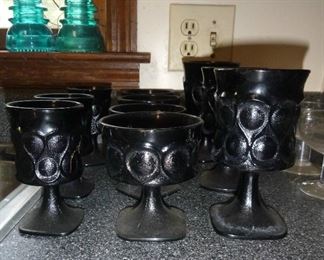 some cool black mid-century glasses we found in an upper cabinet, very dusty