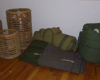 trio of bamboo planter baskets, US Army sleeping bag & blankets