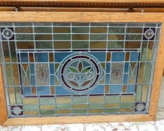 7. Antique Stained Glass Window