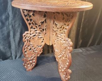 Ornate wooden side table