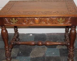 Antique carved mahogany writing desk
