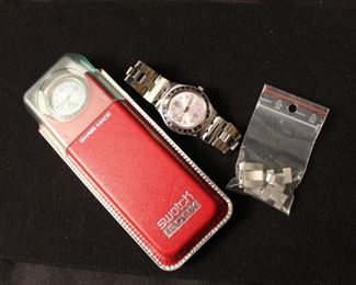 Two Swatch Irony YLS702G watches