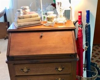 Handsome small drop front desk with drawers.