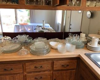 Large selection of dishes and glassware.