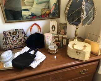 Vintage handbags and avon perfumes.