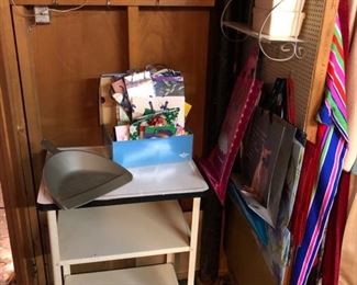 Metal and porcelain rolling cart.