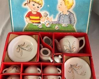 New in the box, vintage child's tea set.